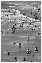 People in water, Santa Monica Beach. Santa Monica, Los Angeles, California, USA (black and white)