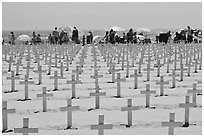 Crosses and beachgoers. Santa Monica, Los Angeles, California, USA ( black and white)