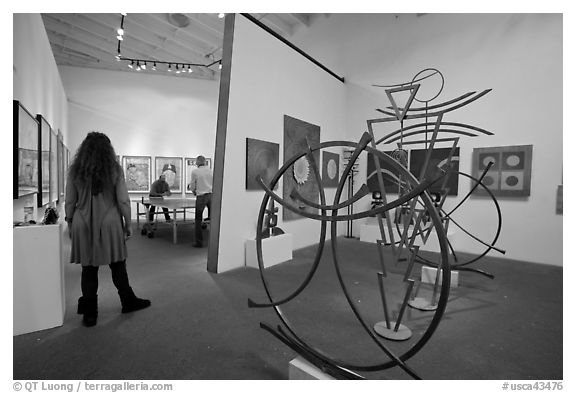 Contemporary art gallery with people playing ping-pong, Bergamot Station. Santa Monica, Los Angeles, California, USA (black and white)