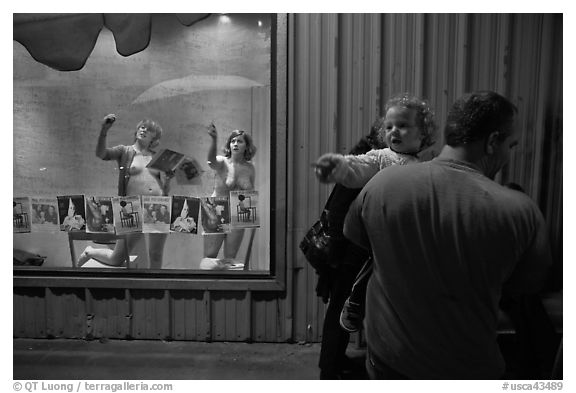 Toddler echoing performance artists, Bergamot Station. Santa Monica, Los Angeles, California, USA (black and white)