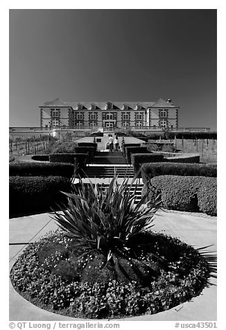 Domain Carneros winery with couple walking upstairs. Napa Valley, California, USA