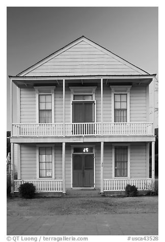 White wooden building at dusk, Somoma Historical state park. Sonoma Valley, California, USA (black and white)