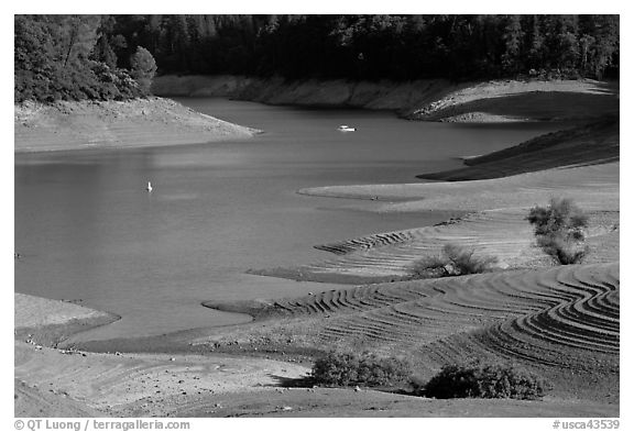 Red earth around an arm of Shasta Lake. California, USA (black and white)