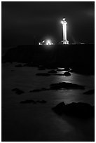 Lighthouse and reflection in surf at night, Point Arena. California, USA (black and white)