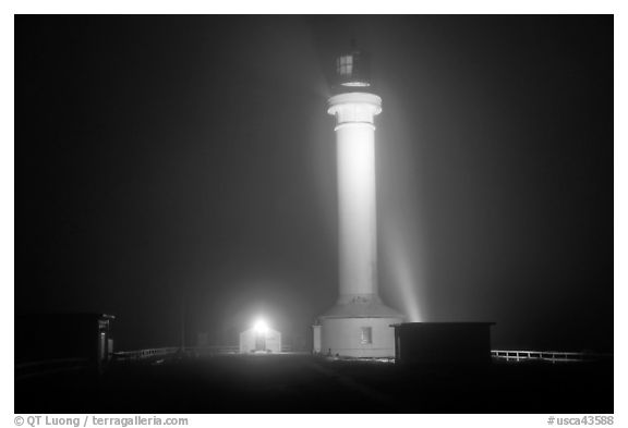 Fog and Point Arena Lighthouse by night. California, USA (black and white)