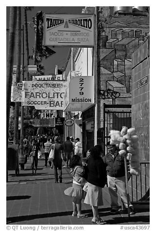 Mission street sidewalk, Mission District. San Francisco, California, USA