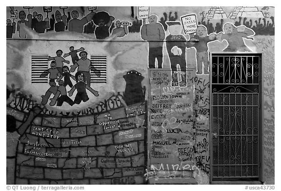 Political mural and door, Mission District. San Francisco, California, USA