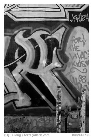 Posts and painted wall detail, Mission District. San Francisco, California, USA