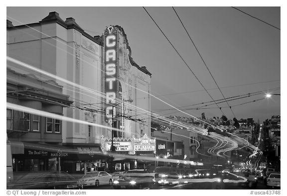 Traffic blurs and Castro Theater at dusk. San Francisco, California, USA