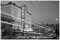 Traffic blurs and Castro Theater at dusk. San Francisco, California, USA (black and white)