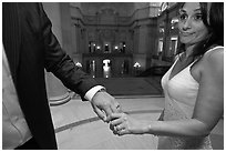 Newly wed bride looks over rings, City Hall. San Francisco, California, USA (black and white)