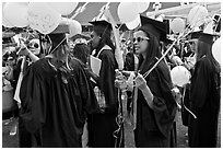 Women students with ballon, commencement. Stanford University, California, USA (black and white)