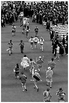 Band members run at the end of commencement ceremony. Stanford University, California, USA (black and white)