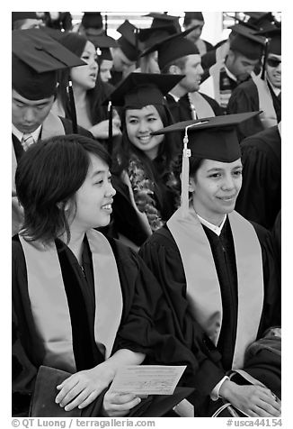 Students in academical dress sitting during graduation ceremony. Stanford University, California, USA (black and white)