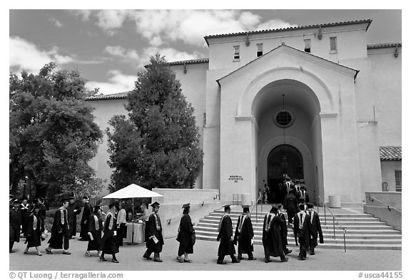 Graduates walking single file into Memorial auditorium. Stanford University, California, USA