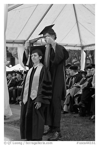 Professor confers doctoral scarf to student. Stanford University, California, USA (black and white)
