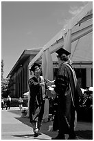 Student receiving handshake prior diploma award. Stanford University, California, USA (black and white)