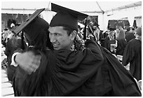 Just graduated students hugging each other. Stanford University, California, USA (black and white)