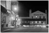 Main street and National Hotel by night, Jackson. California, USA (black and white)