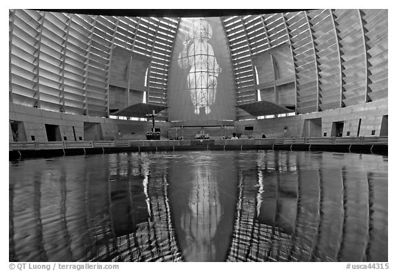 Interior reflected in Baptismal font, Oakland Cathedral. Oakland, California, USA