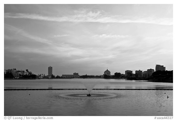 Lake Meritt, aeration fountain at sunset. Oakland, California, USA (black and white)