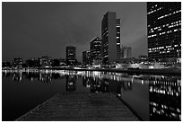 High-rise buildings, deck, and Lake Meritt, dusk. Oakland, California, USA (black and white)