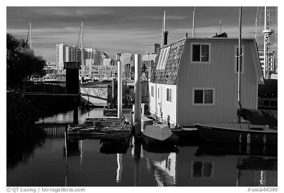 Houseboat and Oakland skyline. Oakland, California, USA (black and white)