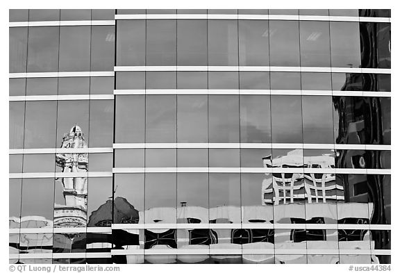 Reflections in glass buiding. Oakland, California, USA