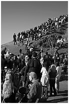 Spectators on bluff during mavericks contest. Half Moon Bay, California, USA (black and white)