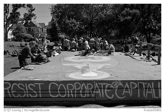 People gathered behind podium, Peoples Park. Berkeley, California, USA