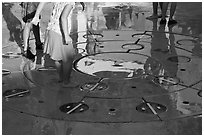 Reflections of children playing in fountain, Gilroy Gardens. California, USA (black and white)