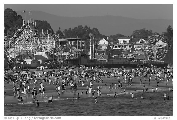 Crowded beach scene. Santa Cruz, California, USA (black and white)