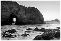 Pfeiffer Beach arch at sunset. Big Sur, California, USA (black and white)