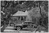 Classic car on Ocean Avenue. Carmel-by-the-Sea, California, USA ( black and white)