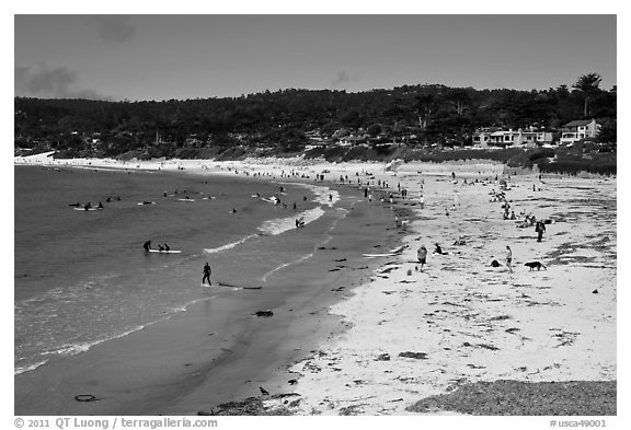 Beachgoers on Carmel Beach. Carmel-by-the-Sea, California, USA (black and white)
