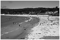 Beachgoers on Carmel Beach. Carmel-by-the-Sea, California, USA (black and white)