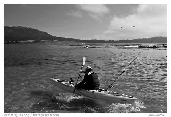 Sea kayaking into Carmel Bay. Carmel-by-the-Sea, California, USA (black and white)