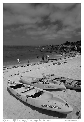 Sea kayaks on beach, Lovers Point. Pacific Grove, California, USA (black and white)