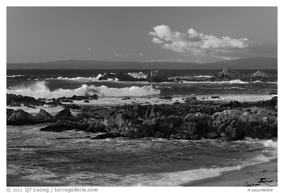 Surf and rocks at sunset, Monterey Bay. Pacific Grove, California, USA