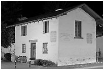 Casa del Oro store house at night. Monterey, California, USA (black and white)