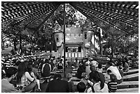 Families watch puppet performance, Happy Hollow Park. San Jose, California, USA (black and white)