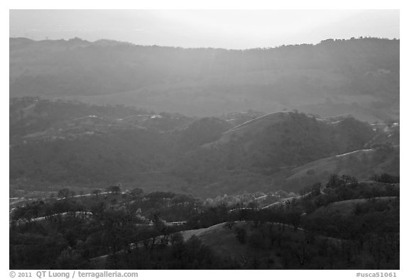 Hills below Mount Hamilton at sunset. San Jose, California, USA (black and white)