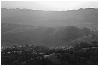 Hills below Mount Hamilton at sunset. San Jose, California, USA (black and white)