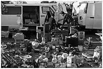 Vans and household items for sale, San Jose Flee Market. San Jose, California, USA (black and white)