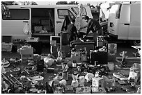 Vans and household items for sale, San Jose Flee Market. San Jose, California, USA (black and white)