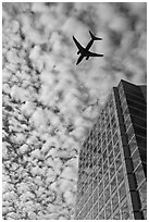 Adobe Tower and commercial aircraft. San Jose, California, USA (black and white)