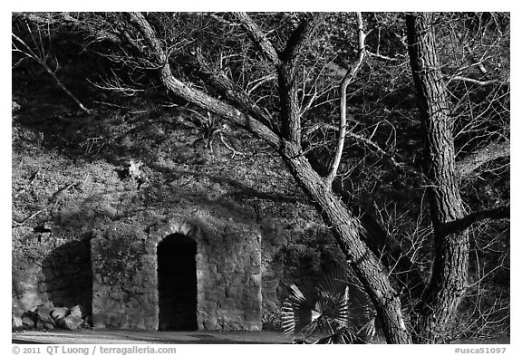 Grotto stonework around mineral springs. San Jose, California, USA (black and white)