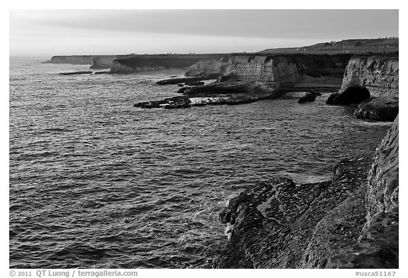 Sandstone sea cliffs at sunset, Wilder Ranch State Park. California, USA (black and white)