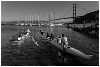 Outrigger canoes and Golden Gate Bridge. California, USA (black and white)