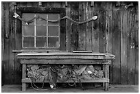 Shed with fishing gear and Chinese dragon, China Camp State Park. San Pablo Bay, California, USA (black and white)